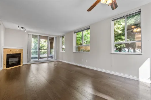 Spacious and bright living room with cozy fireplace