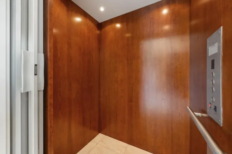 Cherry Wood paneling in Elevator